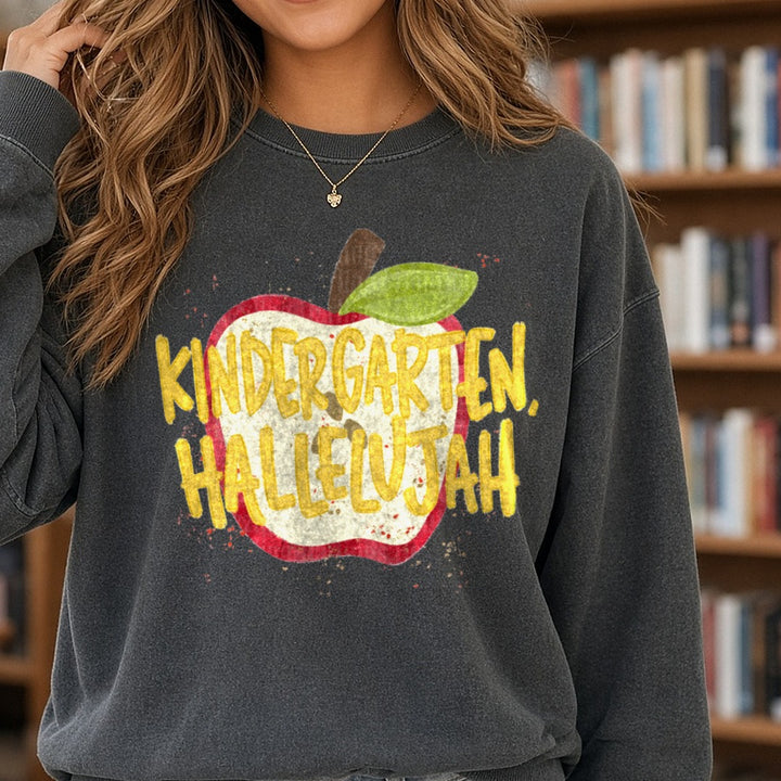 Kindergarten Hallelujah Red Apple Back to School Design DTF transfer shown on a Comfort Colors sweatshirt