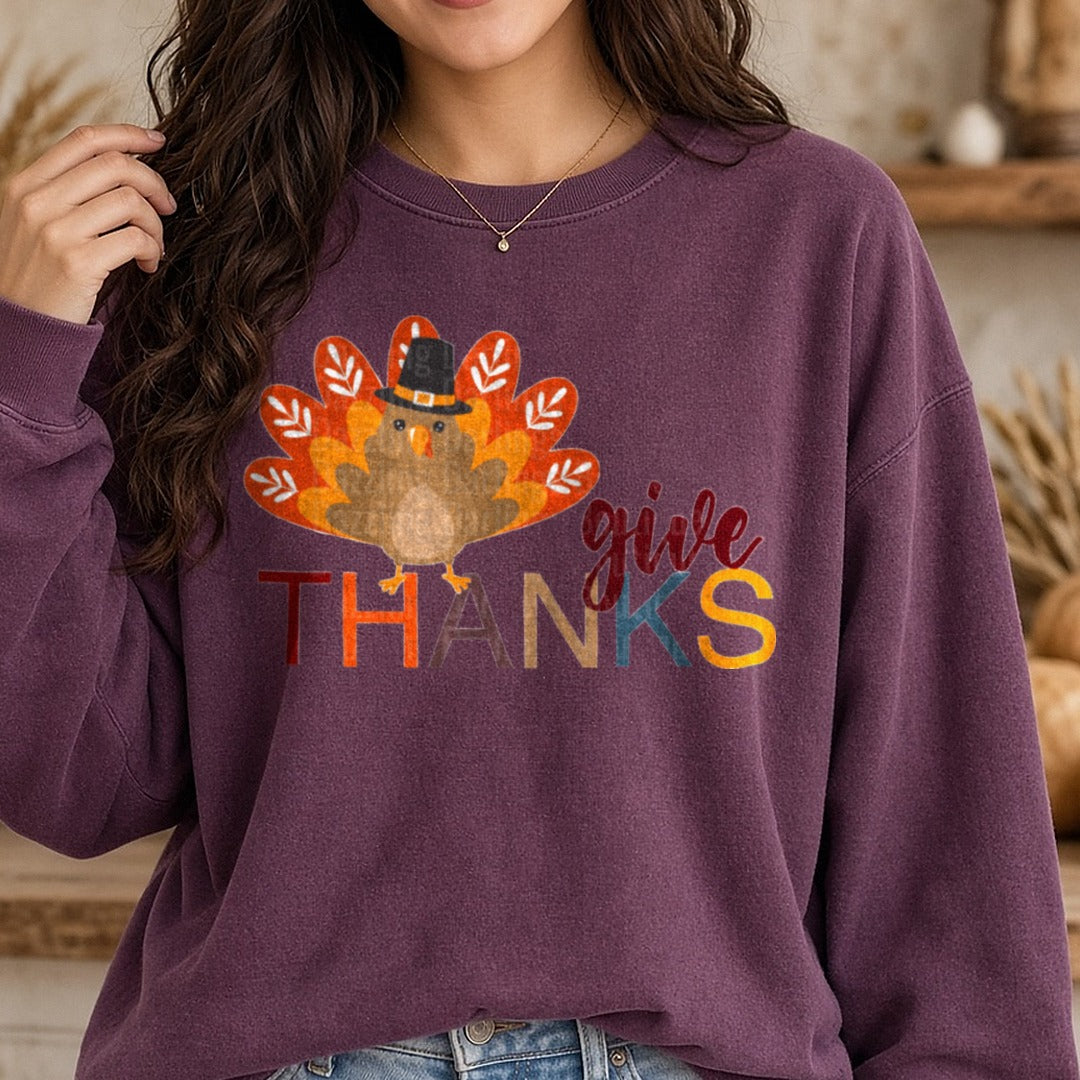 Give Thanks Turkey Pilgrim Hat Multicolor DTF transfer shown on a Comfort Colors sweatshirt