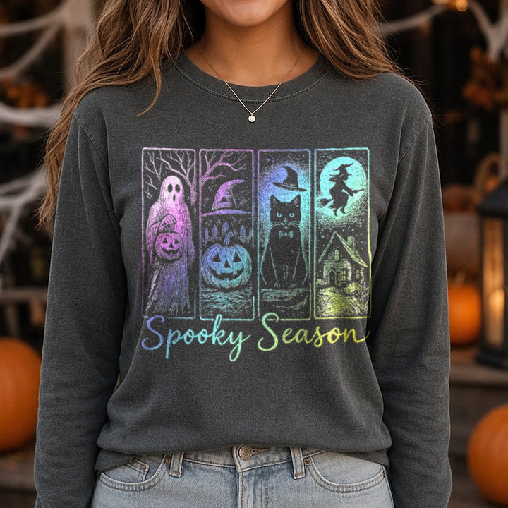 Spooky Season Holographic Ghost Pumpkin Cat Witch Panels Halloween DTF transfer shown on a Comfort Colors long sleeve tee