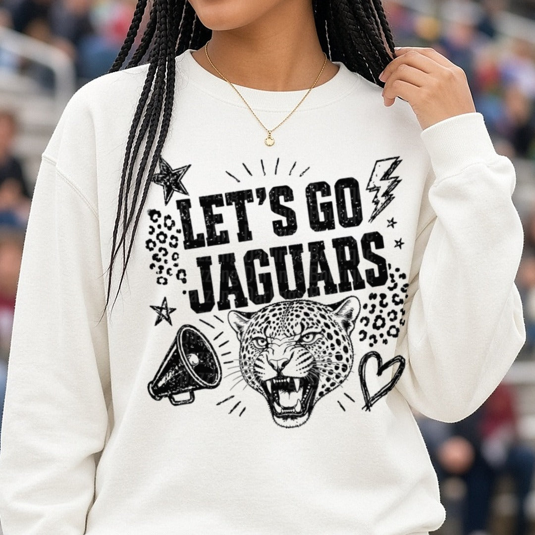 Let's Go Jaguars Roaring Big Cat Spirit Megaphone Design DTF transfer shown on a Comfort Colors sweatshirt