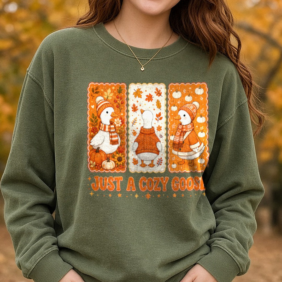 Just A Cozy Goose DTF transfer shown on a Comfort Colors sweatshirt