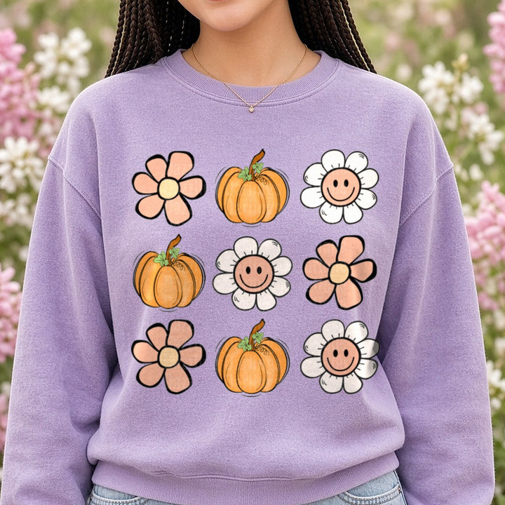 Smiley Face Flowers and Pumpkins DTF transfer shown on a Comfort Colors sweatshirt