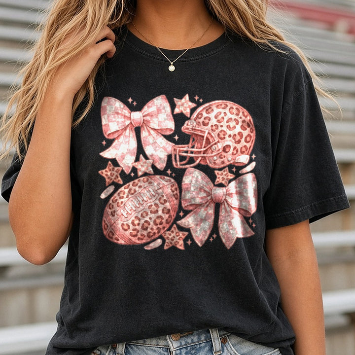 Pastel Pink Coquette Football DTF transfer shown on a Comfort Colors tee