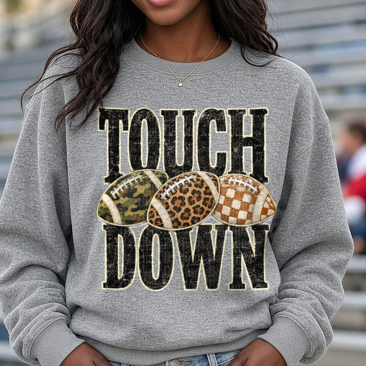 Touchdown Camo, Leopard, Checkered DTF transfer shown on a Comfort Colors sweatshirt