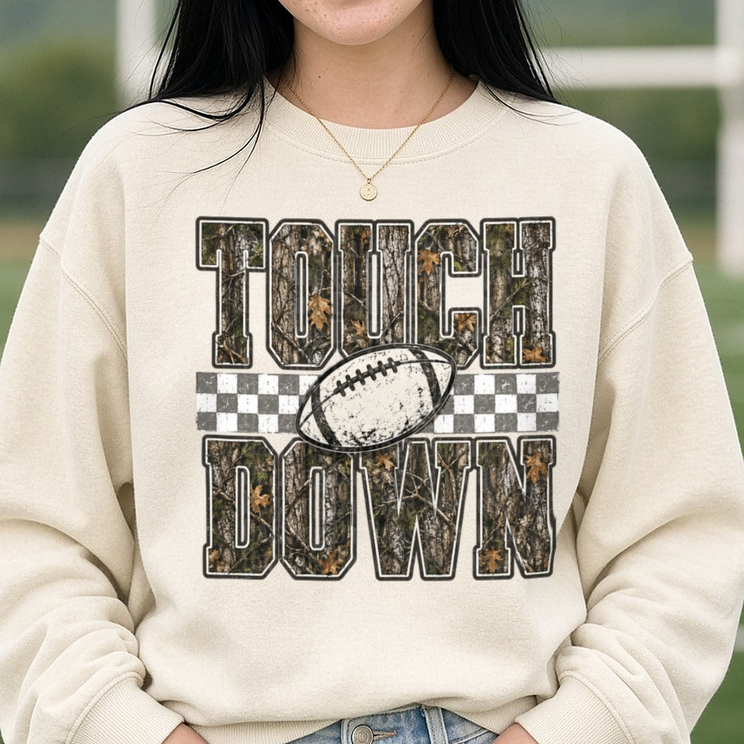 Camo Touch Down Football DTF transfer shown on a Comfort Colors sweatshirt