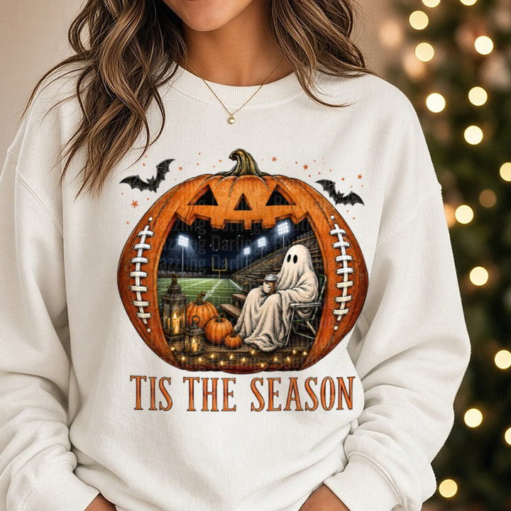 Tis The Season Ghost on Field DTF transfer shown on a Comfort Colors sweatshirt