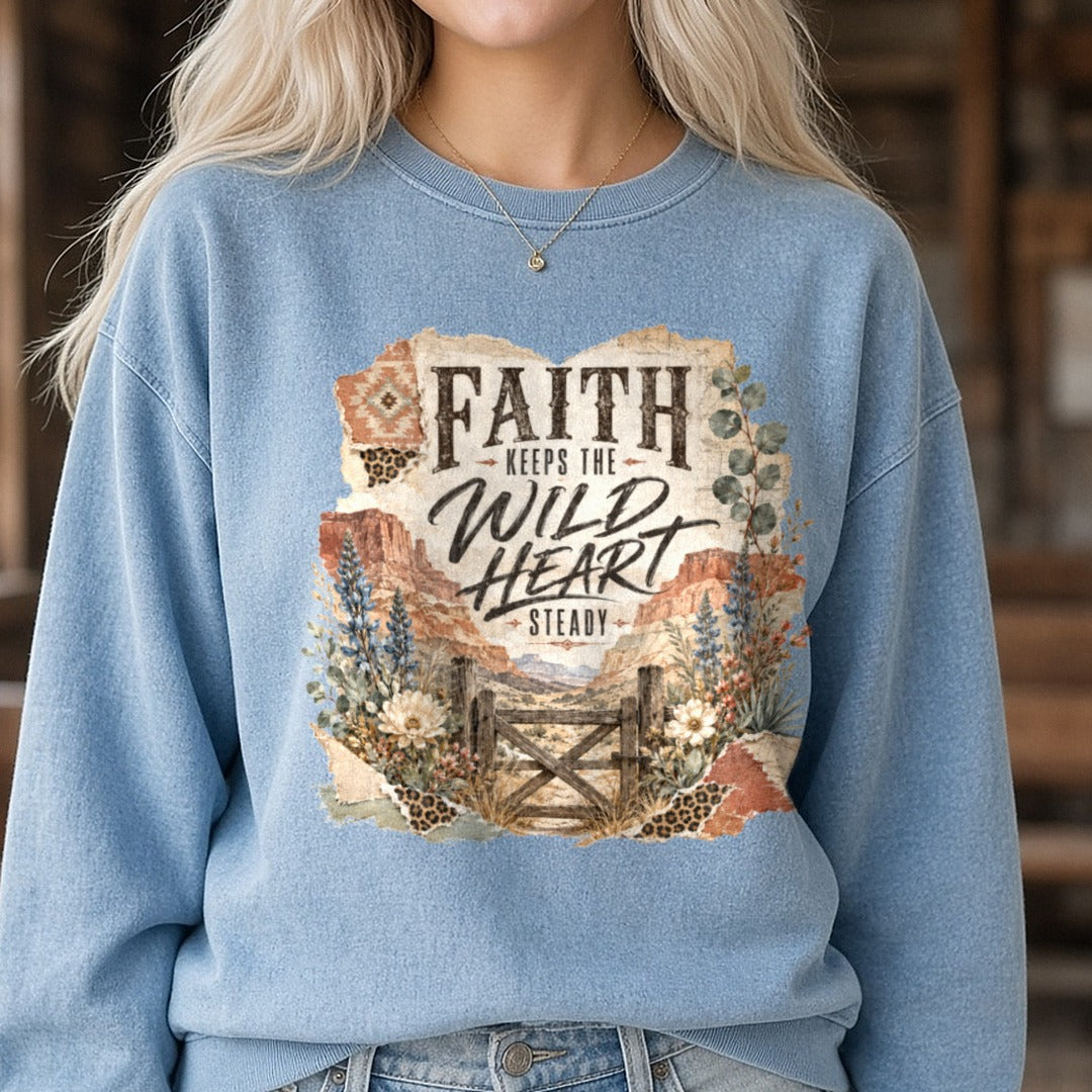 Faith Keeps The Wild Heart Steady DTF transfer shown on a Comfort Colors sweatshirt