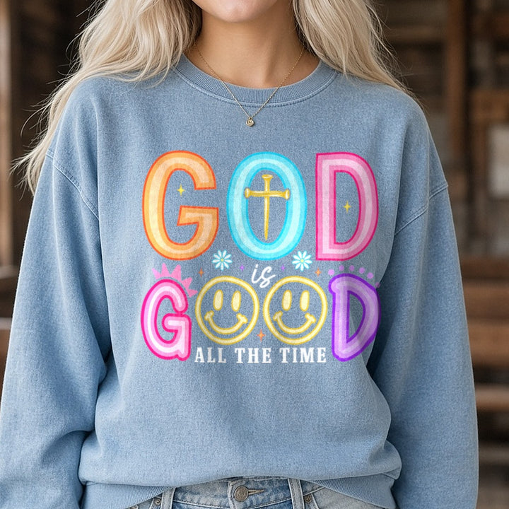 Neon God Is Good All The Time DTF transfer shown on a Comfort Colors sweatshirt
