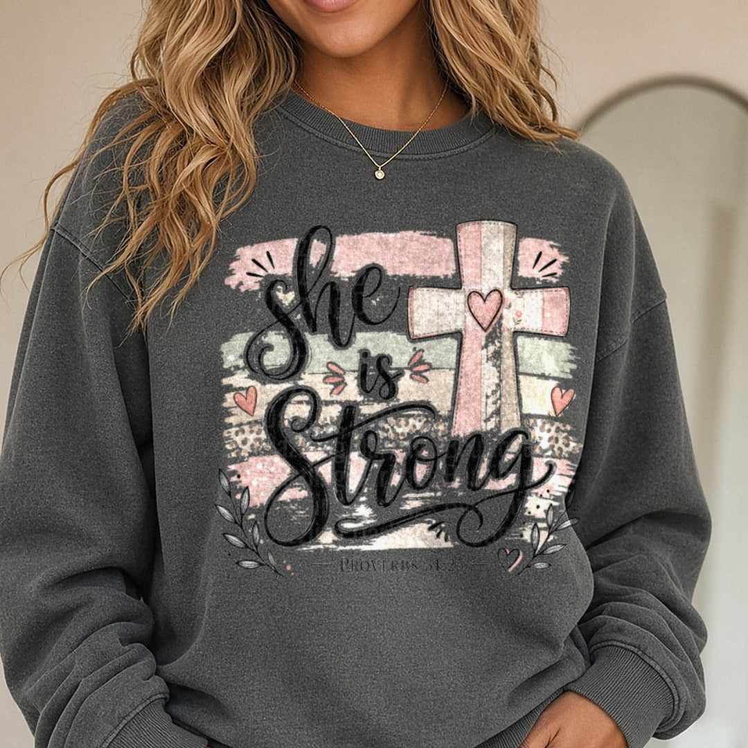 She Is Strong DTF transfer shown on a Comfort Colors sweatshirt