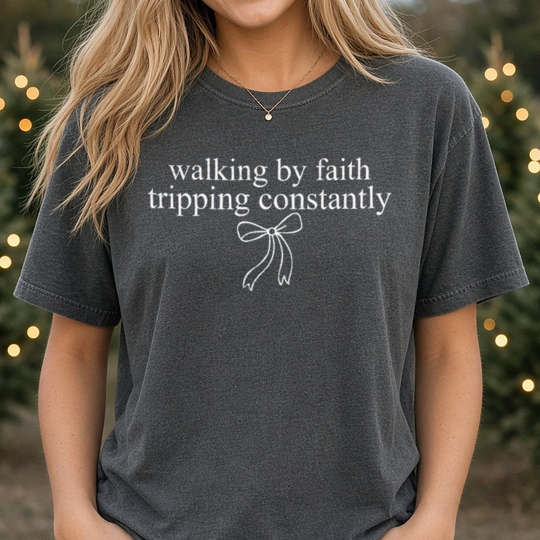 Walking By Faith Tripping Constantly DTF transfer shown on a Comfort Colors tee