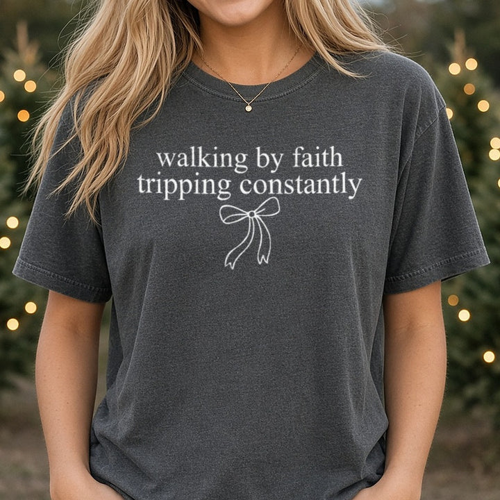 Walking By Faith Tripping Constantly DTF transfer shown on a Comfort Colors tee