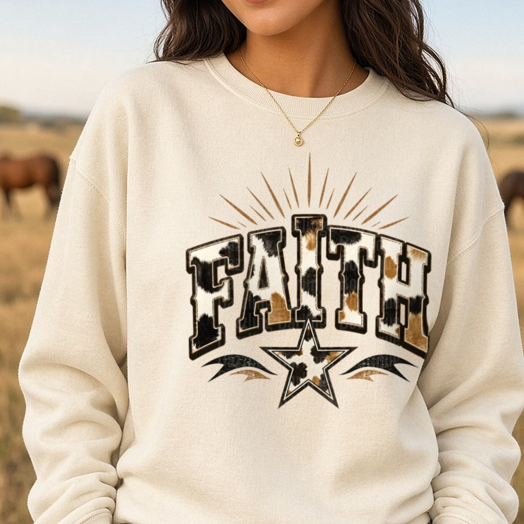 Faith Cow Print DTF transfer shown on a Comfort Colors sweatshirt