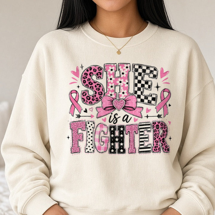 She Is A Fighter DTF transfer shown on a Comfort Colors sweatshirt