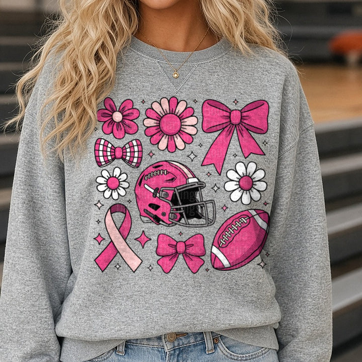 Football Breast Cancer DTF transfer shown on a Comfort Colors sweatshirt