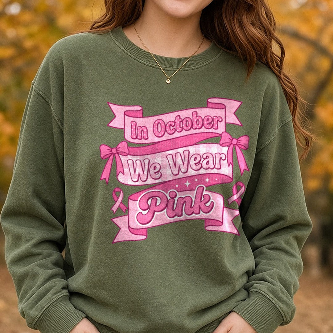 In October We Wear Pink Bow DTF transfer shown on a Comfort Colors sweatshirt