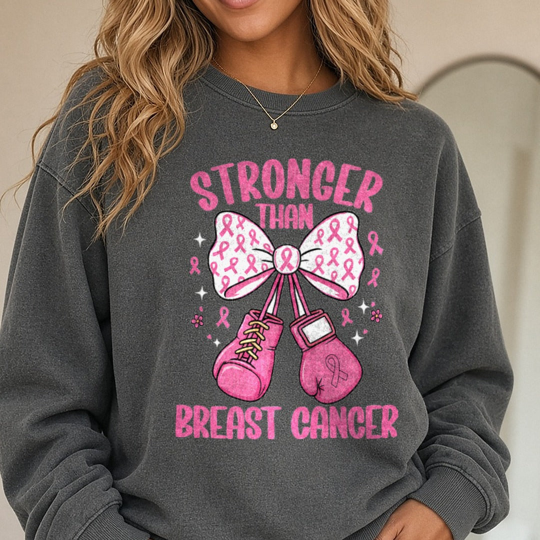 Stronger Than Breast Cancer Gloves DTF transfer shown on a Comfort Colors sweatshirt