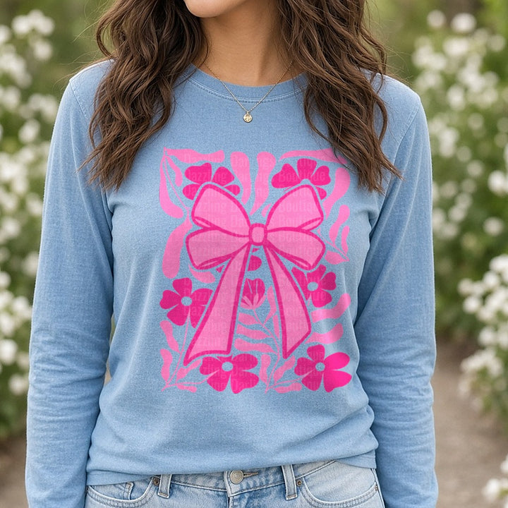 Pink Bow Flowers DTF transfer shown on a Comfort Colors long sleeve tee