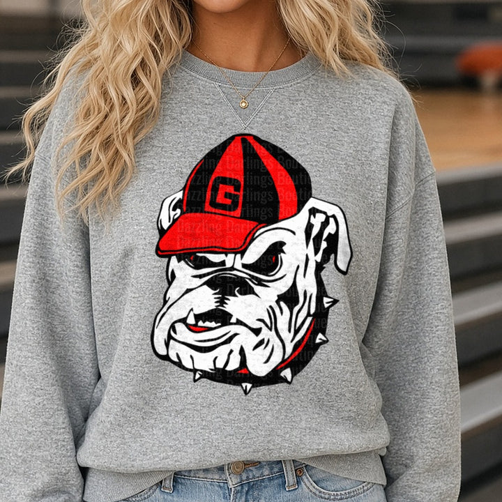 Georgia Bulldogs UGA Mascot Head Red Black Cap Logo DTF transfer shown on a Comfort Colors sweatshirt