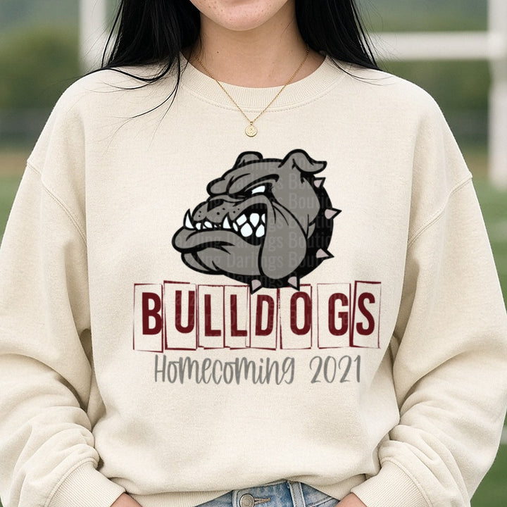 Bulldogs Homecoming 2021 Gray Mascot Head with Spiked Collar DTF transfer shown on a Comfort Colors sweatshirt