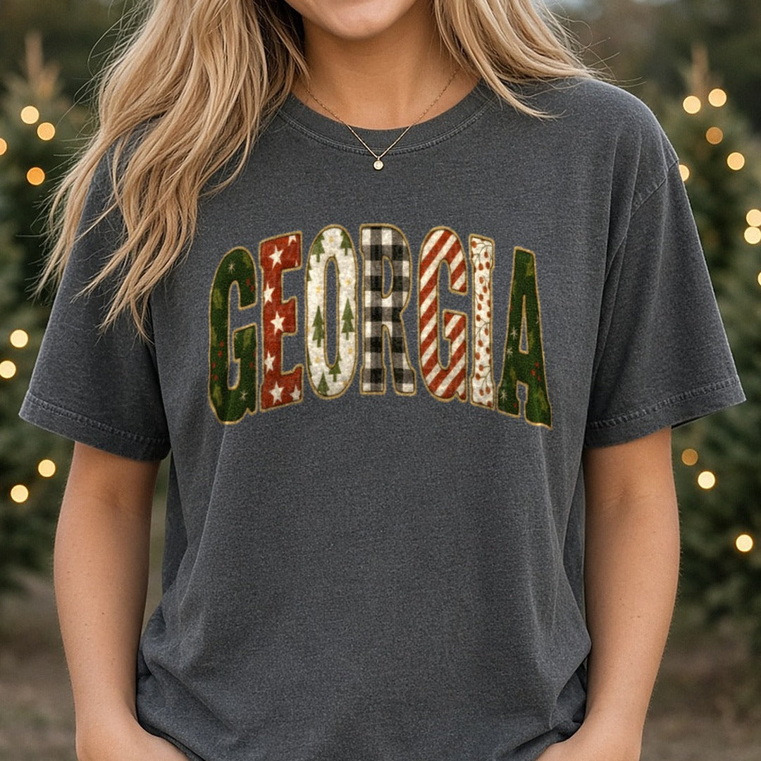 Georgia Christmas Patchwork Arch Letters Holiday Design DTF transfer shown on a Comfort Colors tee