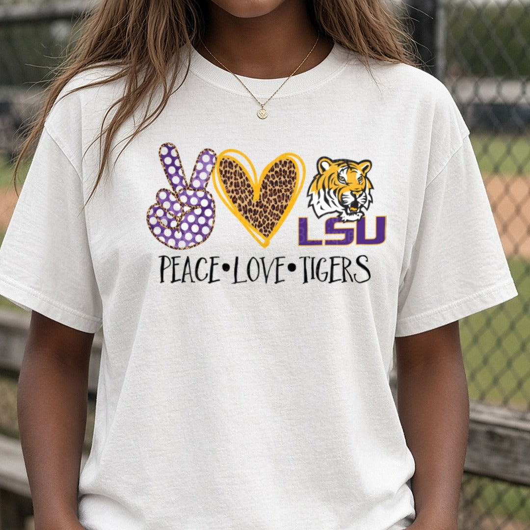 Peace Love LSU Tigers Purple Polka Dot Leopard Heart Design DTF transfer shown on a Comfort Colors tee