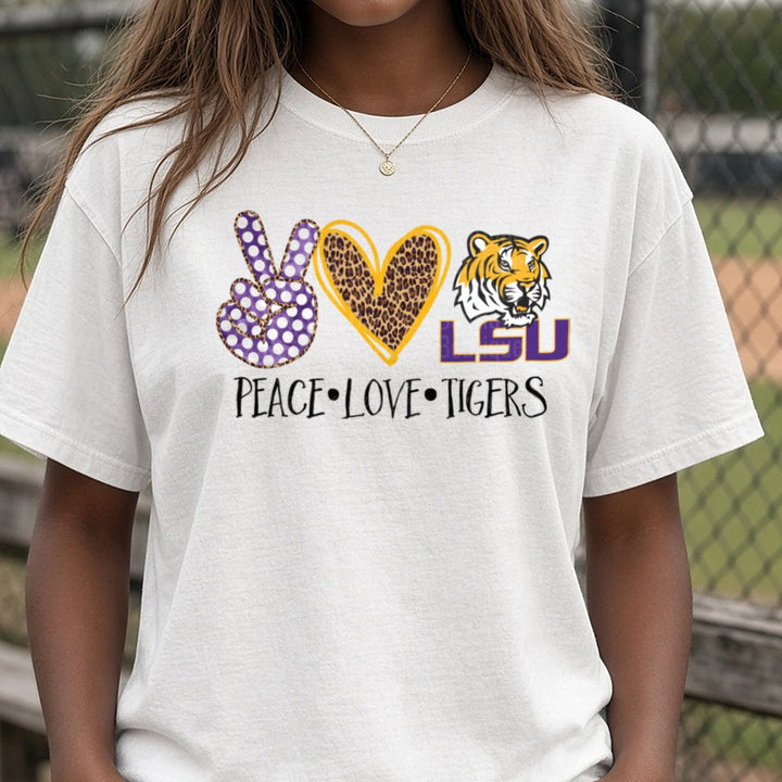 Peace Love LSU Tigers Purple Polka Dot Leopard Heart Design DTF transfer shown on a Comfort Colors tee