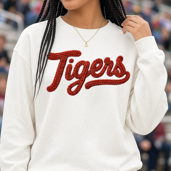 Tigers Knitted Yarn Script Text Red Braided Letter Word DTF transfer shown on a Comfort Colors sweatshirt