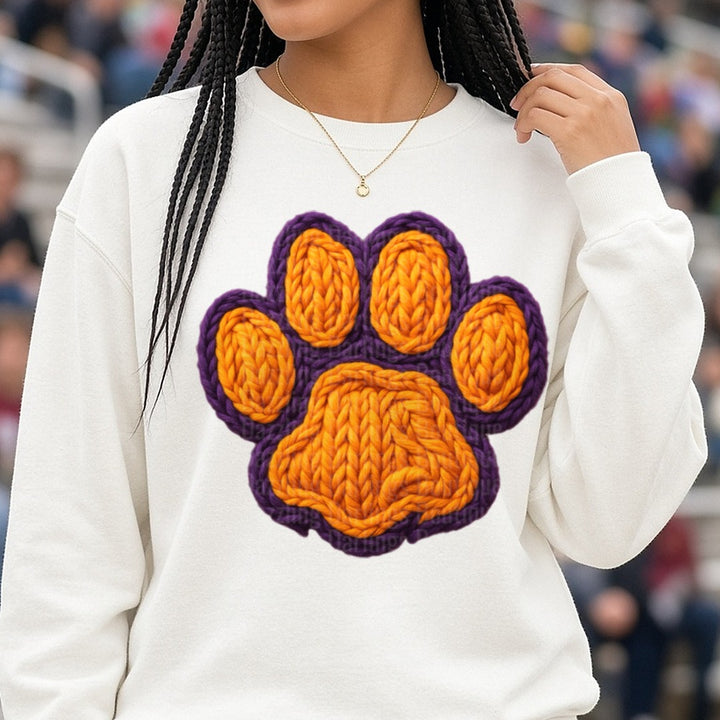 Purple and Orange Knitted Yarn Paw Print DTF transfer shown on a Comfort Colors sweatshirt