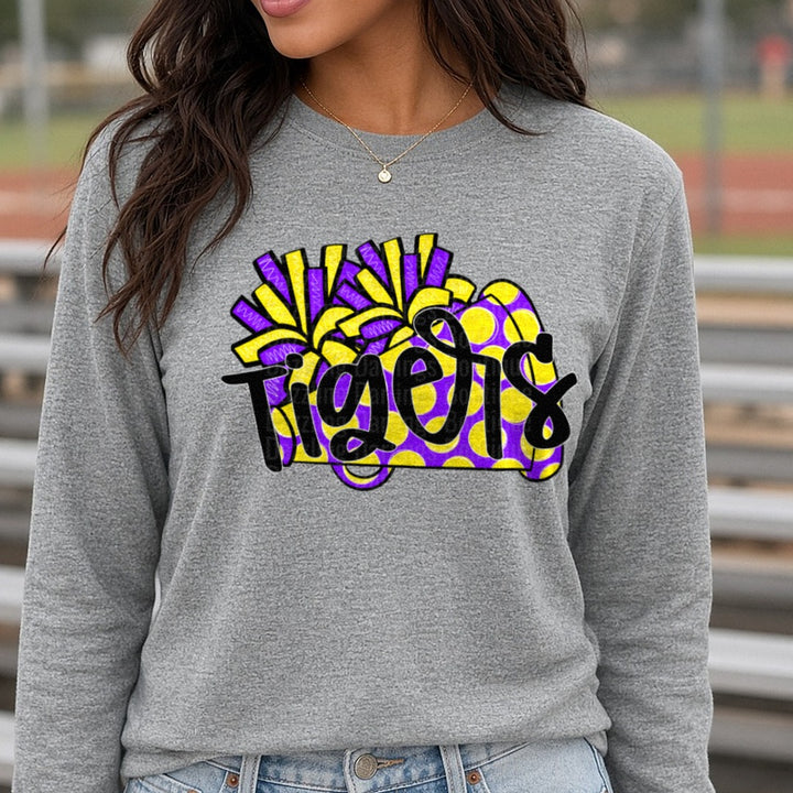 Tigers Purple and Gold Polka Dot Pom Pom Script Design DTF transfer shown on a Comfort Colors long sleeve tee