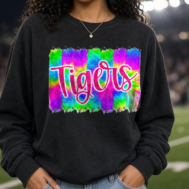 Tigers Script Lettering Colorful Tie Dye Background DTF transfer shown on a Comfort Colors sweatshirt