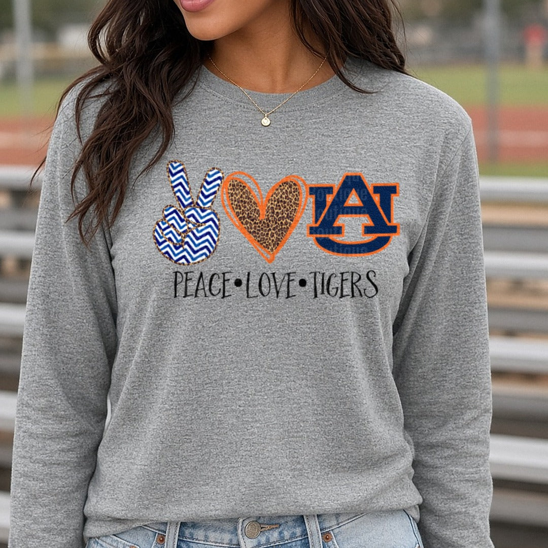 Peace Love Auburn Tigers AU Chevron Leopard Heart Design DTF transfer shown on a Comfort Colors long sleeve tee