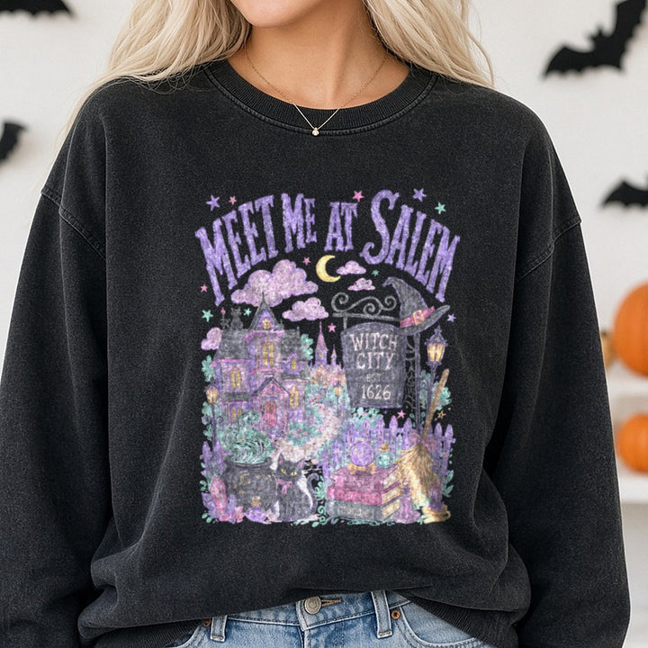 Meet Me At Salem Witch City Est 1626 Halloween Scene DTF transfer shown on a Comfort Colors sweatshirt