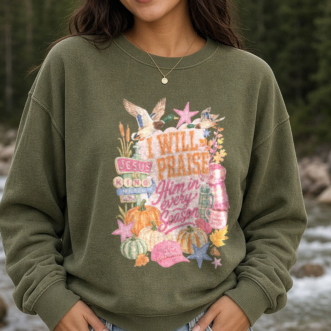 I Will Praise Him In Every Season Fall Faith Christian Duck Hunting Design DTF transfer shown on a Comfort Colors sweatshirt
