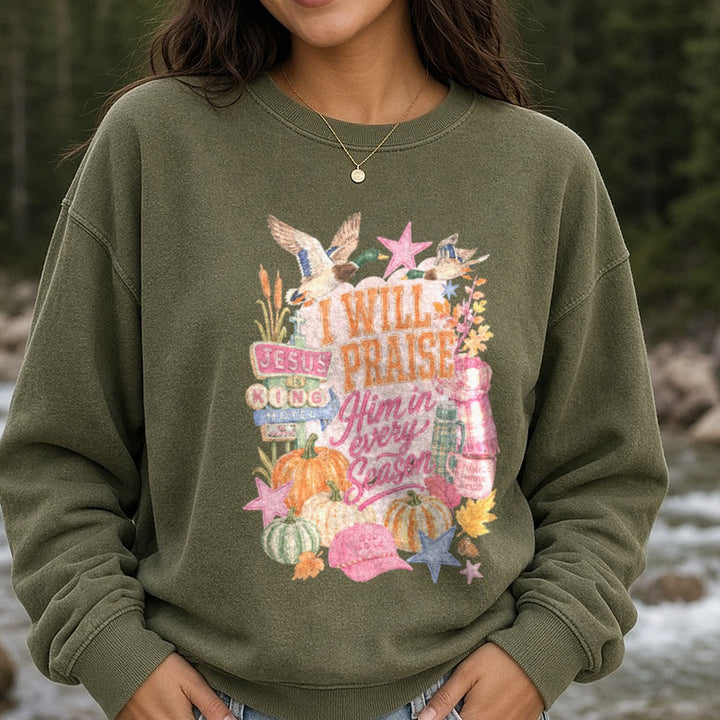I Will Praise Him In Every Season Fall Faith Christian Duck Hunting Design DTF transfer shown on a Comfort Colors sweatshirt