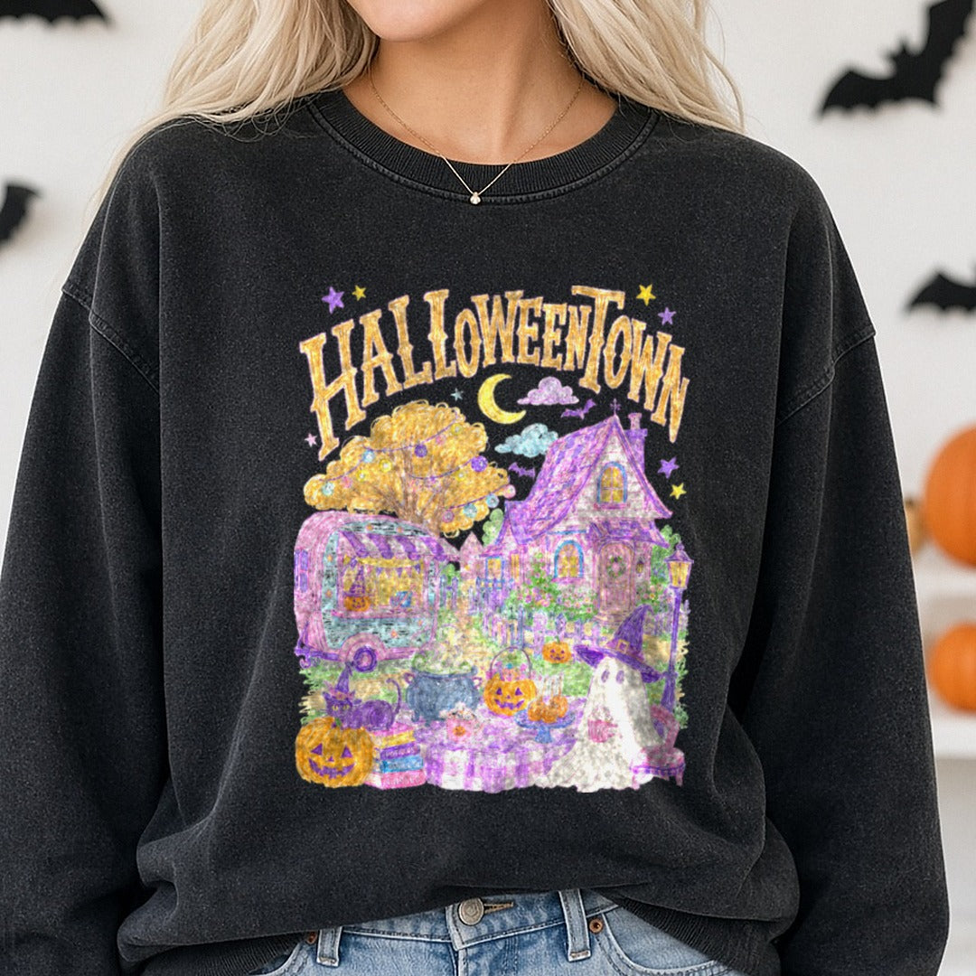 Halloweentown Pastel Whimsical Scene with Ghost and Pumpkins DTF transfer shown on a Comfort Colors sweatshirt