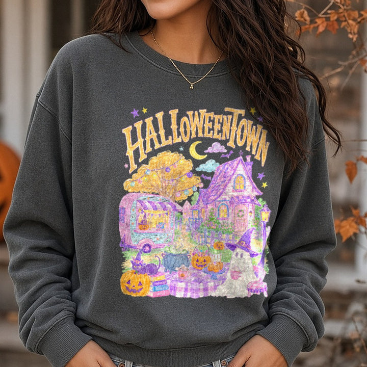 Halloweentown Pastel Whimsical Scene with Ghost and Pumpkins DTF transfer shown on a Comfort Colors sweatshirt