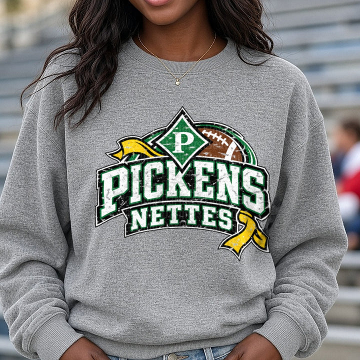 Pickens Nettes Football Distressed Logo Green Gold DTF transfer shown on a Comfort Colors sweatshirt