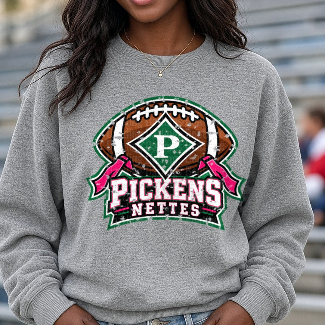 Pickens Nettes Football Distressed Spirit Logo Green Pink DTF transfer shown on a Comfort Colors sweatshirt