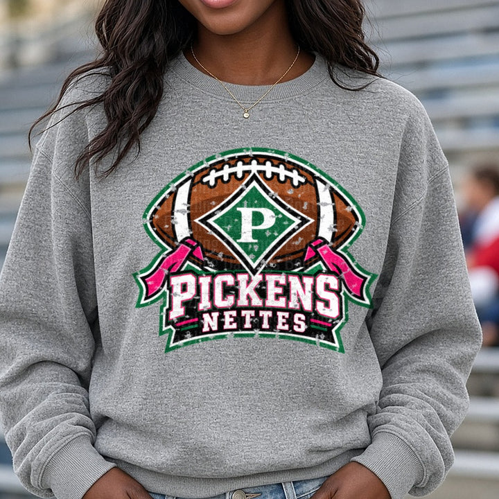 Pickens Nettes Football Distressed Spirit Logo Green Pink DTF transfer shown on a Comfort Colors sweatshirt
