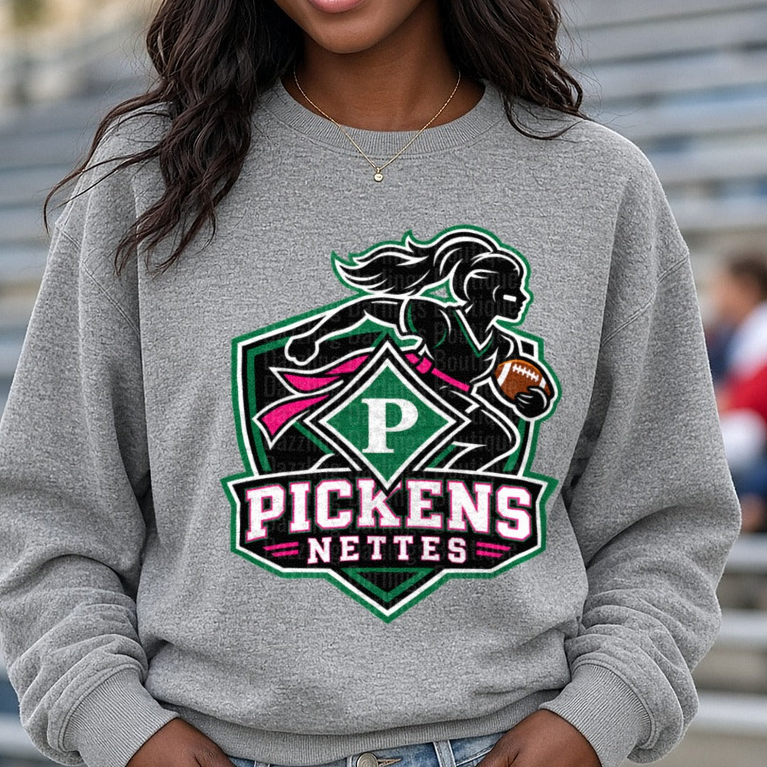Pickens Nettes Female Football Player Shield Logo DTF transfer shown on a Comfort Colors sweatshirt
