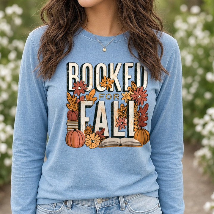 Booked For Fall Leopard Print Pumpkins Flowers Books Reading DTF transfer shown on a Comfort Colors long sleeve tee