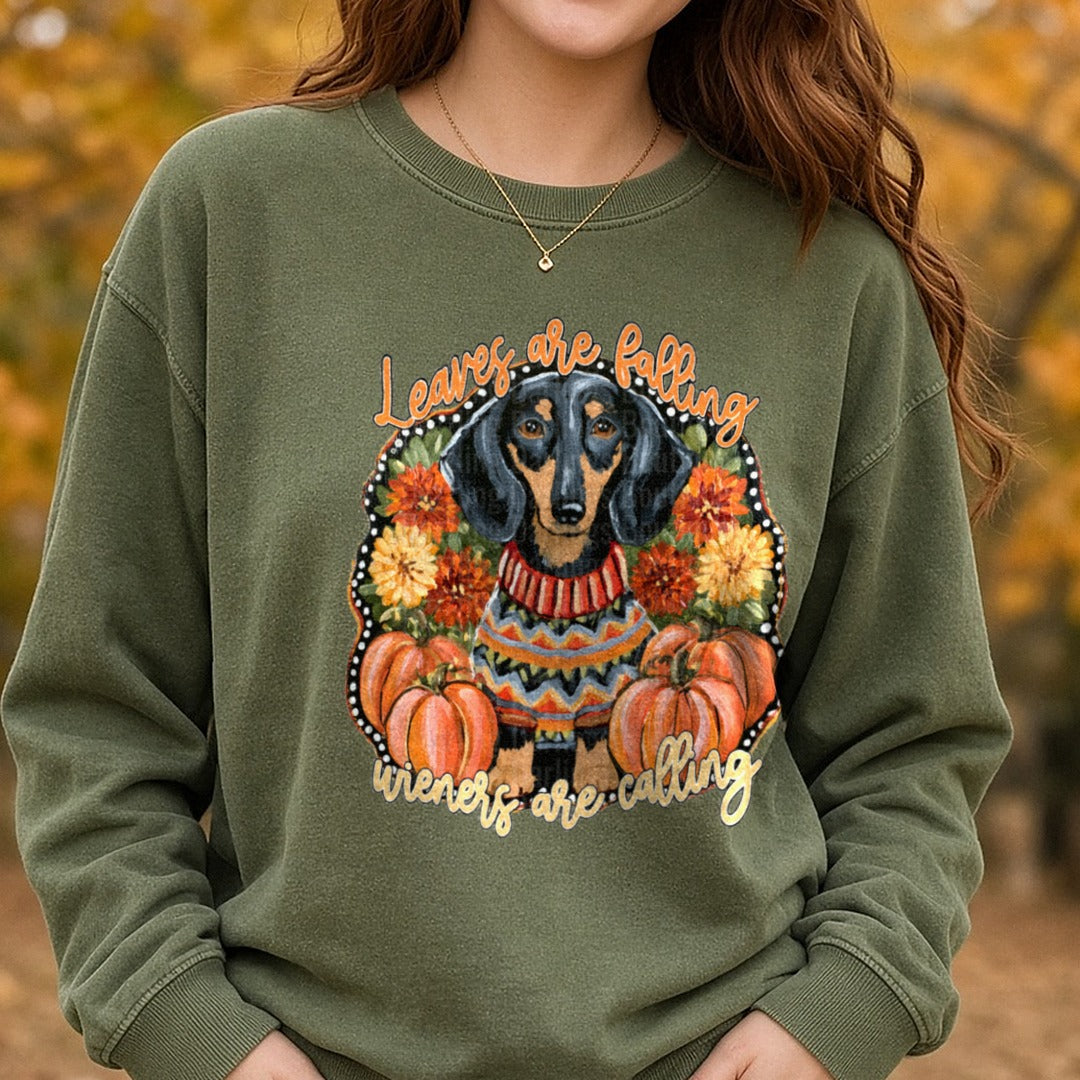 Leaves Are Falling Wieners Are Calling Fall Dachshund DTF transfer shown on a Comfort Colors sweatshirt