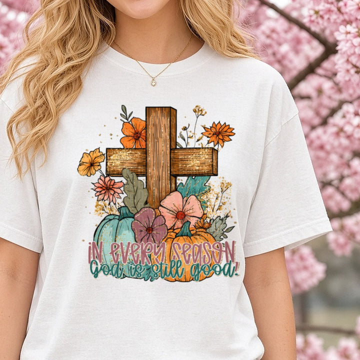 In Every Season God Is Still Good Fall Cross Pumpkins Floral DTF transfer shown on a Comfort Colors tee