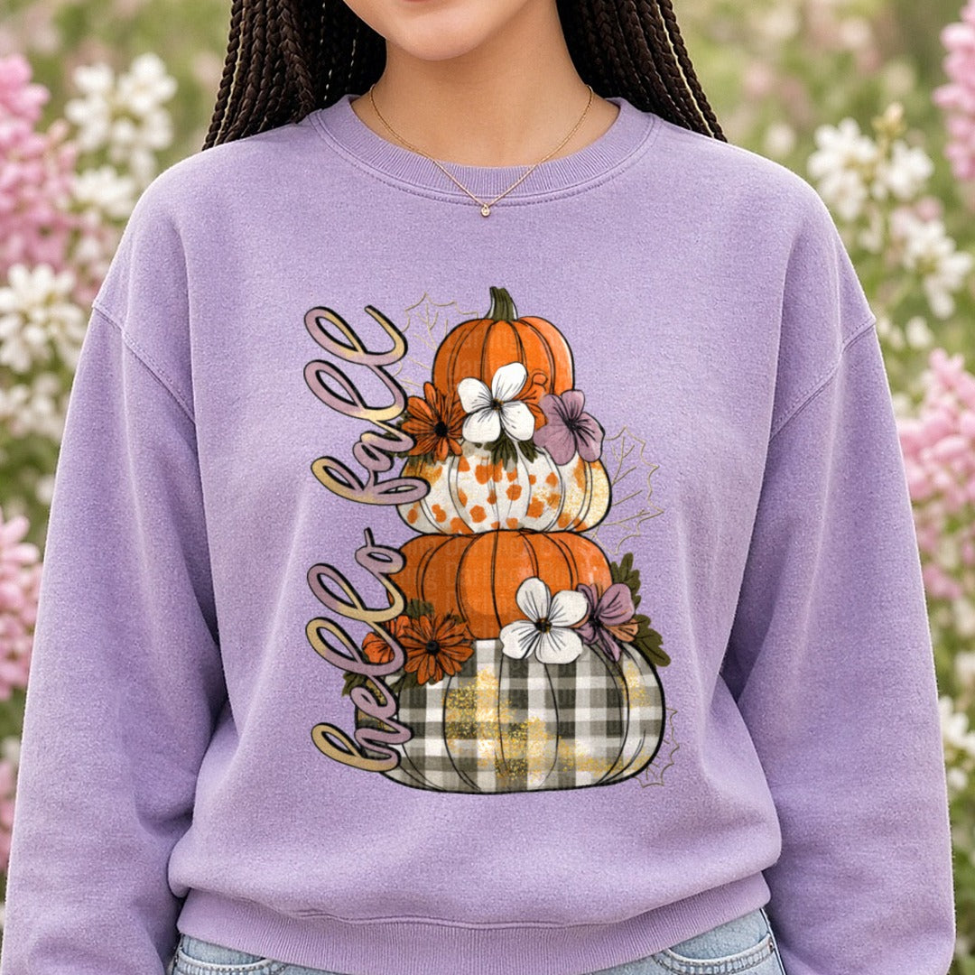 Hello Fall Stacked Pumpkins Floral Buffalo Plaid Tower DTF transfer shown on a Comfort Colors sweatshirt