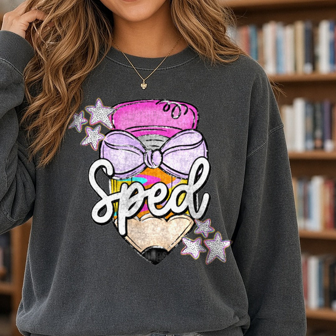 Sped Heart Pencil Purple Bow Pink Eraser Stars Teacher DTF transfer shown on a Comfort Colors sweatshirt