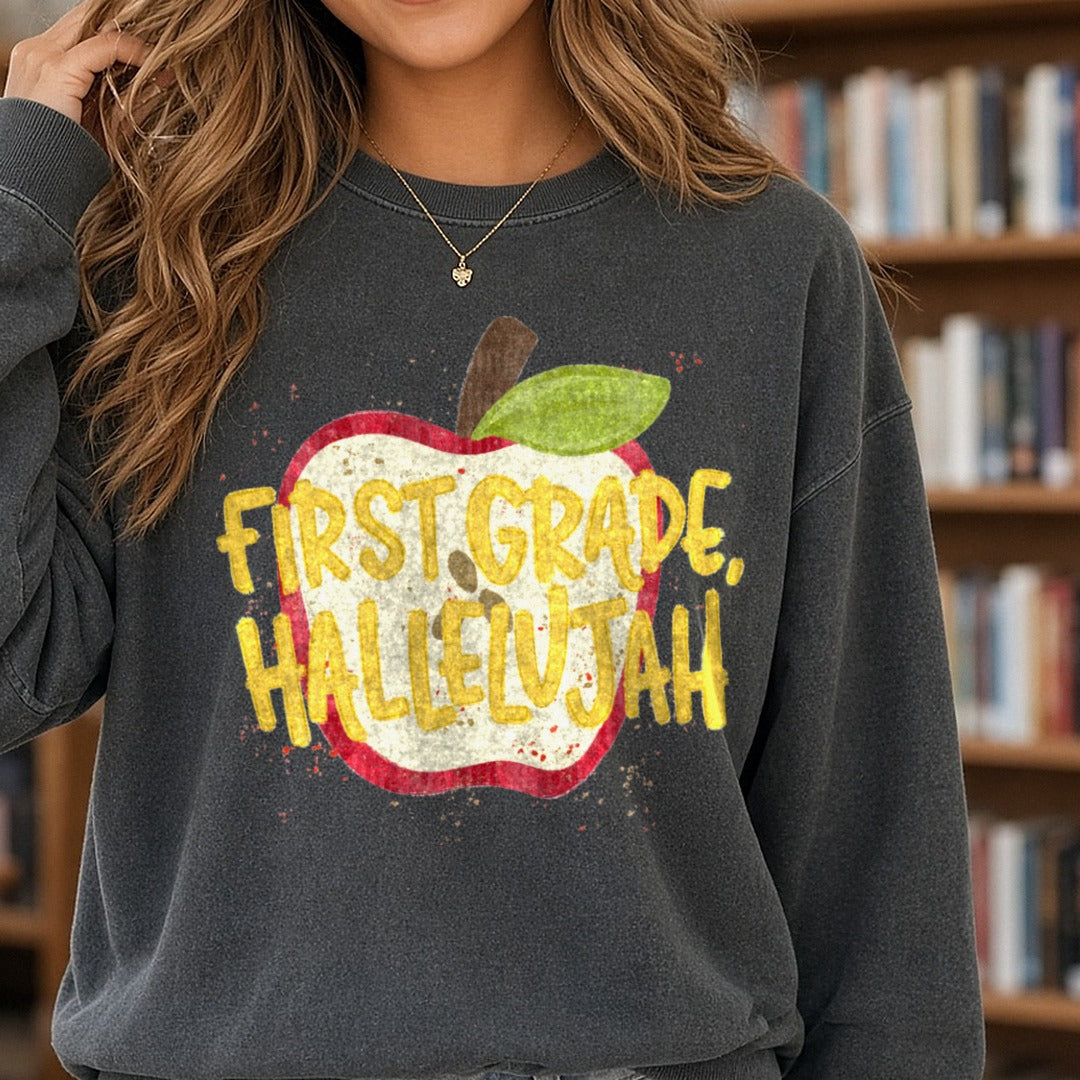 First Grade Hallelujah Red Apple Back to School DTF transfer shown on a Comfort Colors sweatshirt