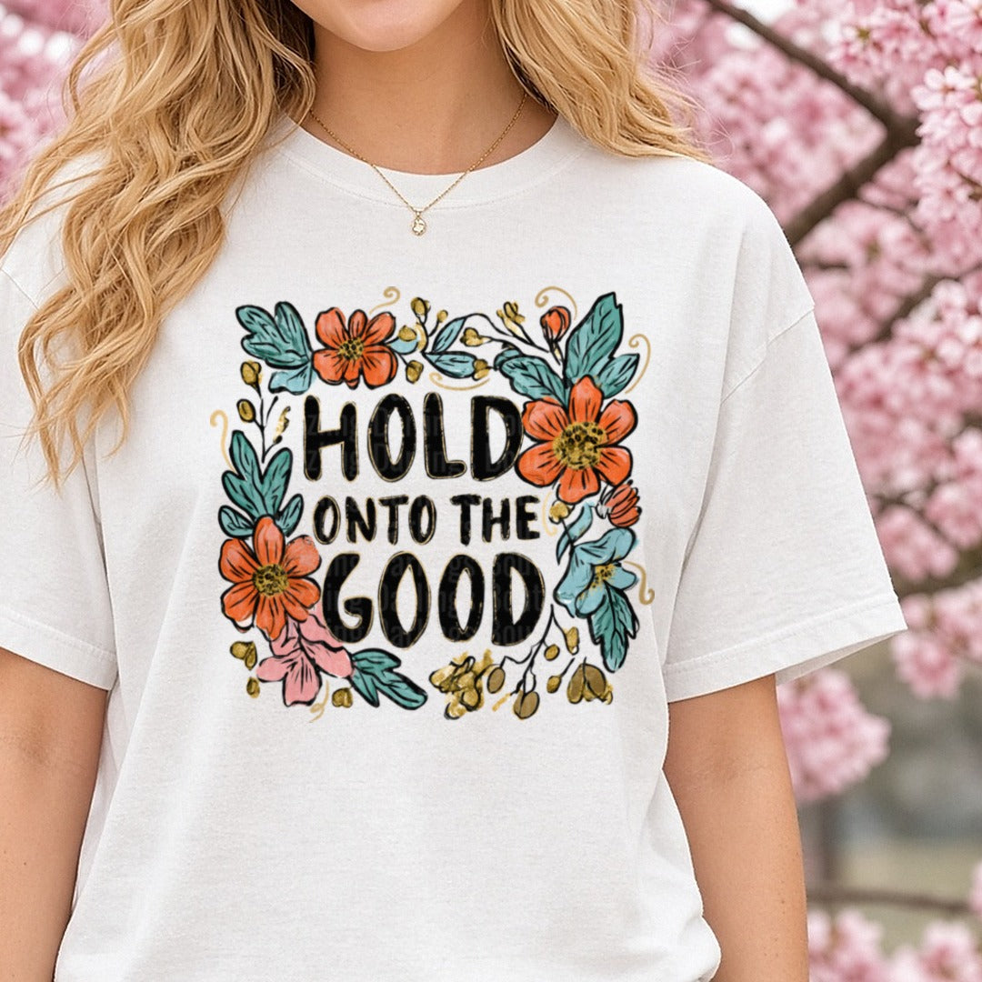 Hold Onto The Good Floral Wildflower Botanical Quote DTF transfer shown on a Comfort Colors tee
