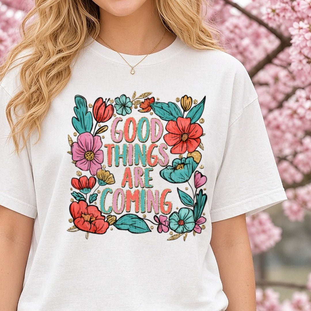 Good Things Are Coming Floral Boho Gold Glitter Quote DTF transfer shown on a Comfort Colors tee