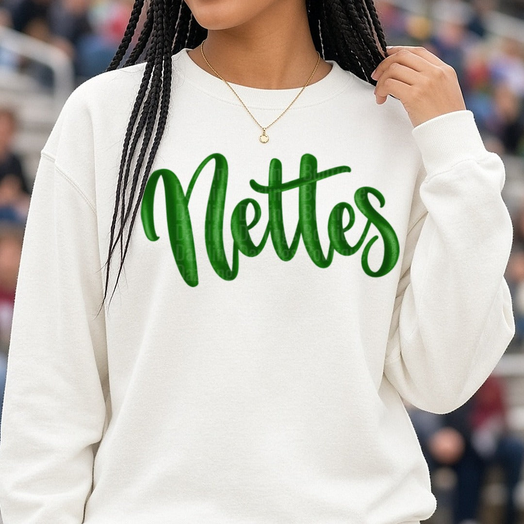 Nettes Dark Green Script Lettering DTF transfer shown on a Comfort Colors sweatshirt