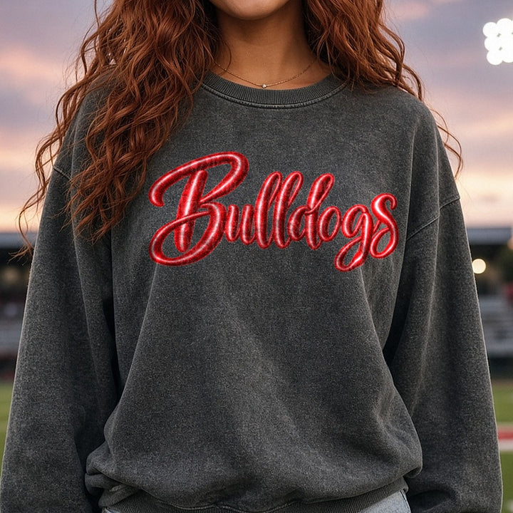 Bulldogs Bold Red Glossy Script Lettering DTF transfer shown on a Comfort Colors sweatshirt